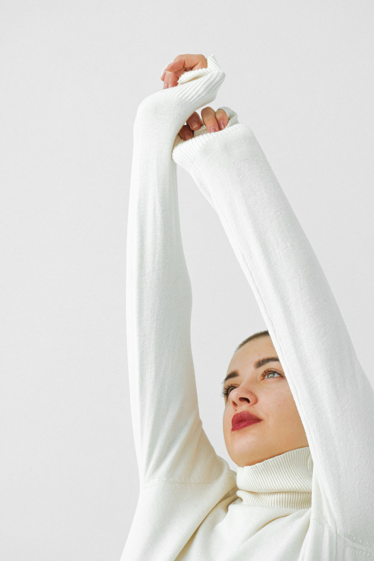 Woman in White Turtleneck Shirt